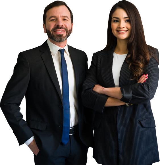 A man and woman wearing suits