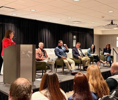 Event with people on stage taking questions